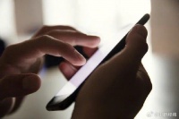 人民日报评一碰手机就跳转广告 这个乱象应彻底整治