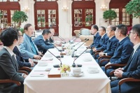 戴厚良会见华为公司创始人任正非