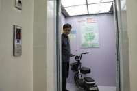 电动车想上楼？没门！这里的电梯够“聪明”！