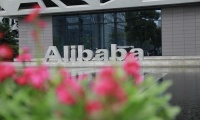 阿里2025财年收入超9963亿、净利润同增77%！张勇等9人退出合伙人