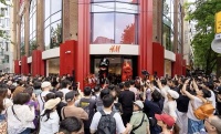 首店落子、快闪引流……上海百年淮海路为何常逛常新？