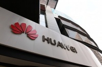 华为一季度营收下降，净利却提升，未来重心转向汽车、云服务 | 看财报